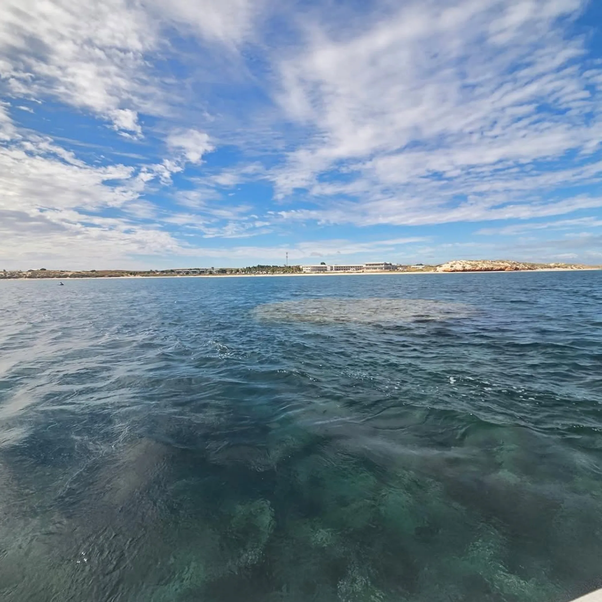 liveaboard boat approaching rowley shoals dry season