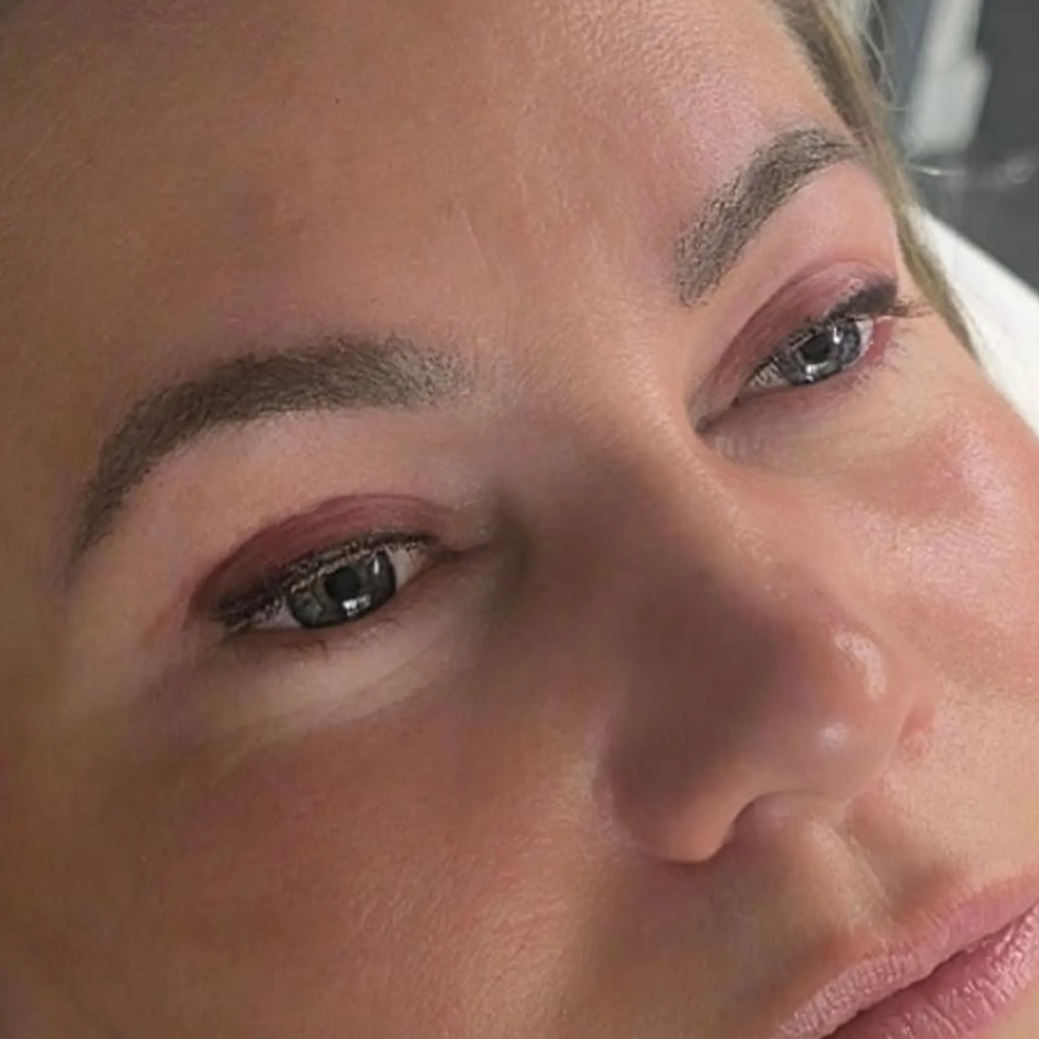 close-up of permanent eyeliner application